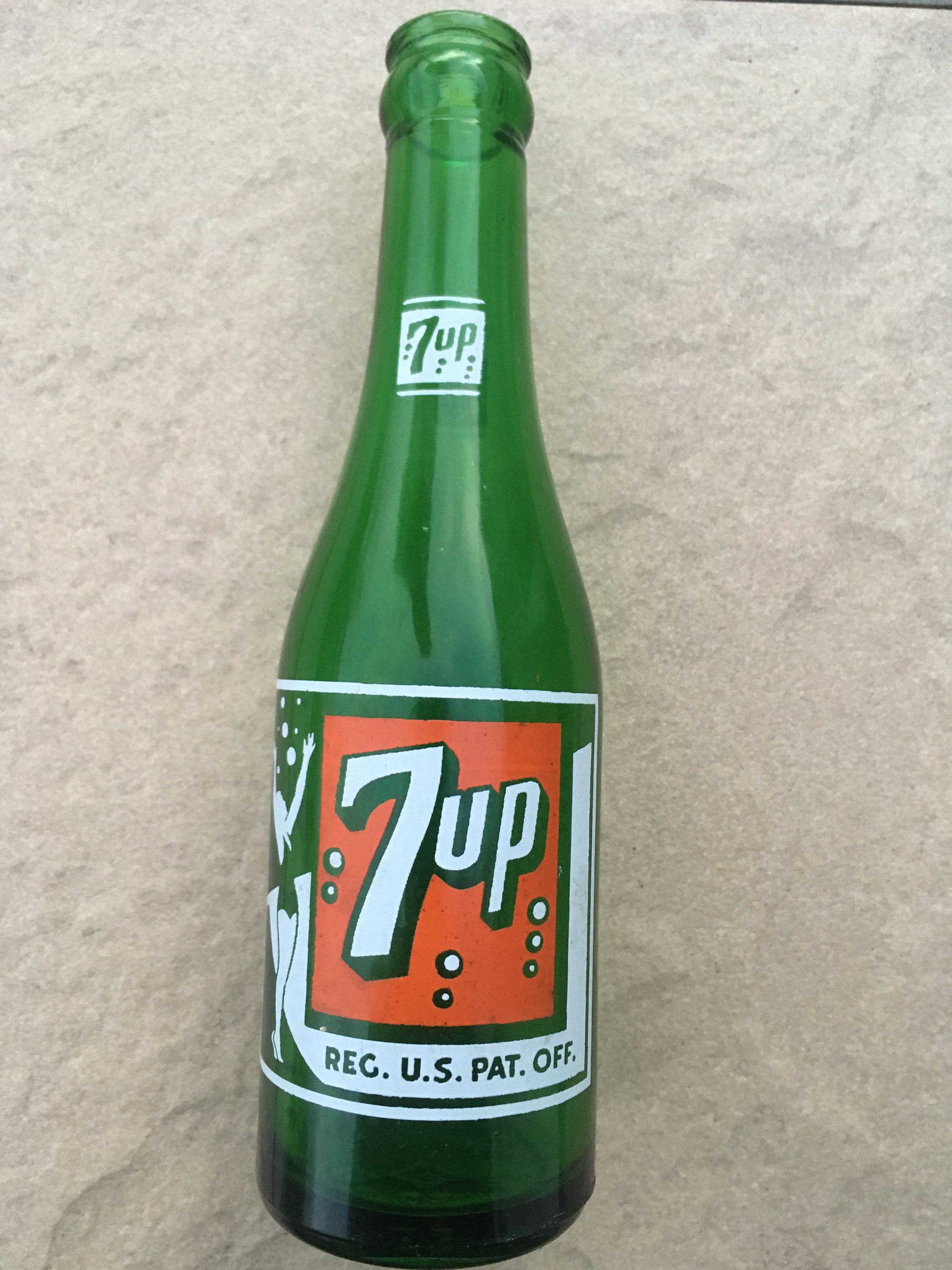 Check out vintage 7up bottles on ebay. 