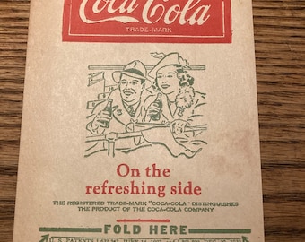Vintage Coca Cola Dry Server, Bottle Drip Protector Sleeve featuring Couple at Sporting Event Holding Coke Bottles