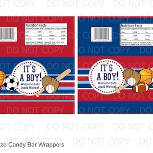 May include: Candy bar wrapper with a red, white and blue striped background. The wrapper features a baseball bat, a baseball, a football, a basketball and a soccer ball. The text "It's a Boy!" is in a circle with a blue background and white polka dots. The text "Welcome Baby Jacob Michael" is below the circle.