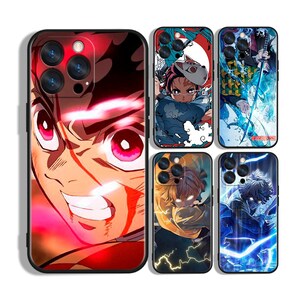 May include: A collection of phone cases featuring anime-style illustrations. The cases showcase vibrant character art with bold colors and dynamic poses. Each case has a black border and a glossy finish, designed for various phone models.