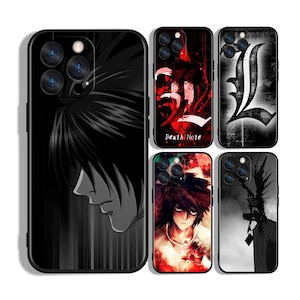 May include: A collection of black phone cases featuring anime-style character designs. The cases showcase various characters in grayscale and vibrant colors, with the text "Death Note" on one case. The cases have a glossy finish.