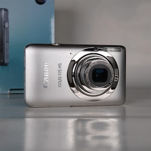 Canon IXUS 115 HS シルバー コンパクトデジタルカメラ Canon IXUS 115 HS - CNET