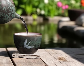 Handmade Ceramic Tea Cup: Mystic Crane Design, Japanese Pottery