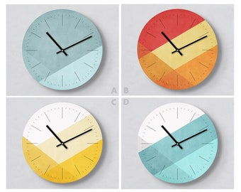 Wall clocks Layer - 4 color combinations to choose from - 3 sizes possible - Quiet movement - Beautiful pattern with modern colors - Decoration with style