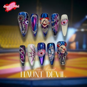 Presse clown effrayante sur les ongles : nail art Halloween yeux rouges
