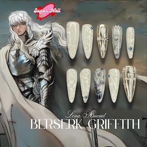 May include: A set of long almond-shaped artificial nails with various designs. The nails feature white, silver, and blue accents, including floral patterns, cross designs, and a character illustration. The text "Sugar Nail" and "BERSERK GRIFFITH" are visible.