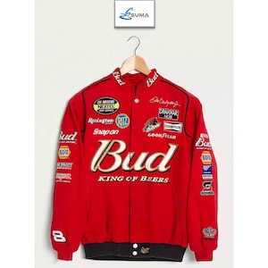 May include: Red racing jacket with multiple sponsor patches, including "Bud," "NASCAR," and "Goodyear." The jacket features a black collar and cuffs, with the number "8" on the left sleeve. The text "Bud King of Beers" is prominently displayed.