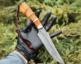 Cuchillo de camping artesanal de acero de Damasco, mango de madera exótica, hoja de espiga completa.