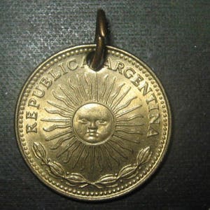 Authentic Gold Tone Sol Argentina Sun Face Coin Pendant Necklace