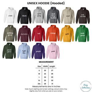 May include: A display of unisex hoodies in various colors, including white, black, and gray. The image also shows measurements in inches for different sizes, with a note about color variations. The hoodies are hooded.