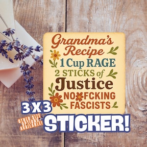 May include: A square sticker with the text "Grandma's Recipe" and the ingredients "1 Cup RAGE, 2 Sticks of Justice, NO FCKING FASCISTS." The sticker is cream-colored with a blue border and the text "STICKER!"