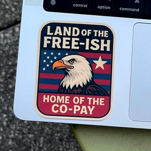 May include: A sticker with a patriotic design featuring an American bald eagle and the text "LAND OF THE FREE-ISH" and "HOME OF THE CO-PAY". The sticker has a red, white, and blue color scheme.