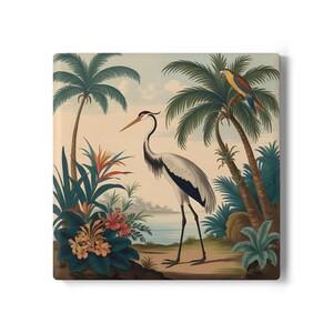 May include: A white and gray heron stands in a tropical landscape with palm trees, lush green foliage, and a small yellow and blue parrot perched on a branch.