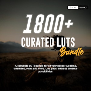 May include: Image features the text "1800+ CURATED LUTS Bundle" in white and yellow against a blurred background of a person and a field. The text "ÉCLAT STUDIO" is in the top right corner. The description reads: "A complete LUTs bundle for all your needs—wedding, cinematic, HDR, and more. One pack, endless creative possibilities."