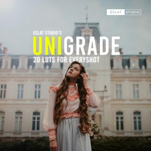 May include: A woman in a light pink and blue dress stands in front of a large building. The image has text that reads "ECLAT STUDIO'S UNIGRADE 20 LUTS FOR EVERYSHOT."