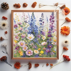 May include: A framed cross-stitch of a colourful wildflower meadow. The artwork features a variety of flowers in shades of purple, blue, pink, and yellow. The wooden frame adds a rustic touch. Dried flowers and decorative elements surround the frame.