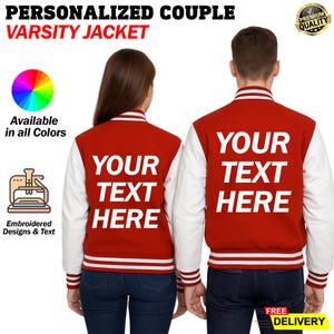 May include: Red and white varsity jackets with the text "YOUR TEXT HERE" on the back. The jackets have white sleeves and red bodies with white stripes at the cuffs and waist. The image includes text that says "PERSONALIZED COUPLE VARSITY JACKET".