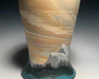 Hand-made vase with Pacific Northwest scenery and marbleized clays.