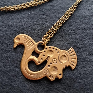 Sami inspired bronze pendant and chain made by Finnish jeweler Kalevala Koru.