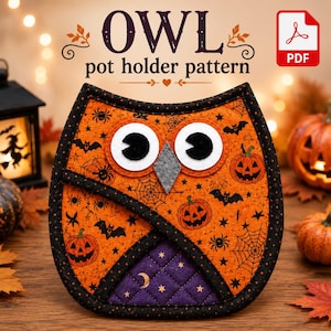 May include: An owl-shaped pot holder featuring an orange fabric with a black Halloween print of pumpkins, bats, spiders, and webs. The owl has large white eyes with black pupils, a gray beak, and a purple quilted belly with gold stars.