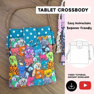 May include: Tablet crossbody bag with a colorful cat pattern. The bag features a teal flap with white polka dots and a brown rope strap. The text "Tablet Crossbody" is at the top. The bag is beginner friendly with easy instructions.