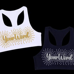 May include: Two sports bras, one white and one navy blue, are displayed against a black background. The white bra has gold text and dots that read "Your Word." The navy blue bra has silver text and dots that read "Your Word."