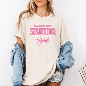 Comfort Colors® Coquette 2026 Senior Shirt, Graduate 2026 Tee, Pink Bow Senior Shirt, Graduation Gift, Class of 2026 Senior Shirt