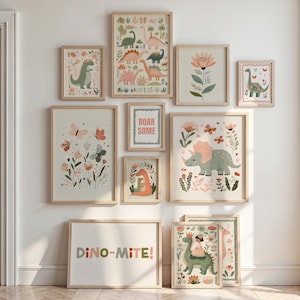 May include: A collection of framed art prints featuring dinosaur and floral illustrations in soft pastel colors. The prints include various dinosaur species, flowers, butterflies, and the text "Dino-Mite!" in a playful font. The frames are light wood.