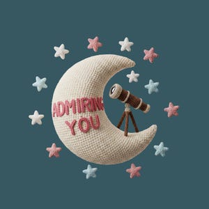 May include: A cream-coloured crocheted crescent moon with the words "Admiring You" in pink. A brown telescope sits on the moon, surrounded by white, pink, and blue stars against a teal background. The image has a handmade aesthetic.
