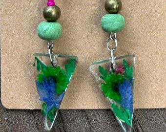 Stunning. Dangle earrings, unique shape, real pressed flowers, pink and green beads, clear resin. Fun to wear!