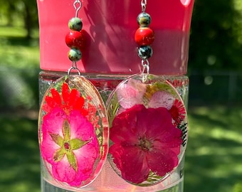 Self-identity. These big dangle earrings make a real statement, for the bold accessory-wearer.
