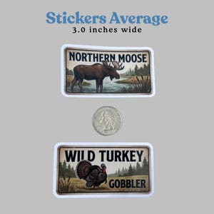 Fishing decal set showing two rectangular vintage wildlife stickers, NORTHERN MOOSE and WILD TURKEY GOBBLER, centered on a gray background. A US quarter is placed between them to show scale, with text noting stickers average 3.0 inches wide. This vintage wildlife sticker pack is a great gift for hunter or angler looking for high-quality, rustic outdoor decor.
