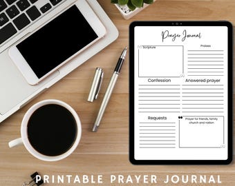 May include: A digital prayer journal on a tablet, with sections for scripture, confession, requests, and praises. A laptop, phone, pen, and coffee cup are on a wooden surface. Text at the top says "USE DIGITALLY OR PRINT AT HOME".