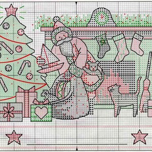 May include: Cross-stitch pattern featuring a Christmas scene. Santa Claus is depicted near a fireplace, with a decorated tree, gifts, and stockings. The color palette includes green, pink, and red, creating a festive holiday theme.