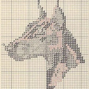 May include: Cross-stitch pattern of a horse's head in profile. The design uses black, red, and white stitches on a grid background. The horse's mane and face are detailed with various stitch patterns.