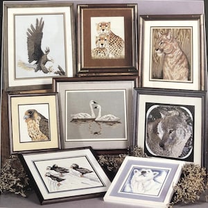 May include: A white ceramic mug with a black handle and the text "But First, Coffee" in a handwritten style. The mug is on a white surface. The mug is approximately 4 inches tall.