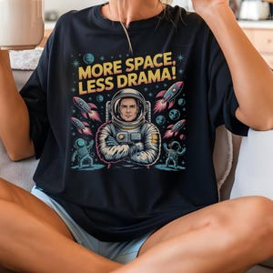 More Space Less Drama T-Shirt: Retro Astronaut Graphic Tee