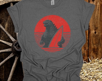 Retro Surfing Godzilla Tee: Vintage Monster Graphic T-Shirt