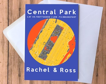 May include: A blue card with a map of Central Park in a circle on it. The map is yellow and orange with a red outline. The text "Central Park" is at the top of the card in white letters. Below the map is the text "Rachel & Ross" in white letters.