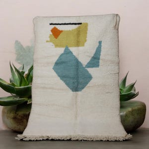Handmade Wool Berber Rug: Boho Moroccan Boujaad Carpet