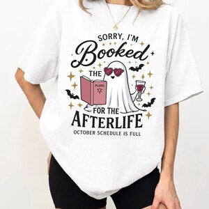 Halloween Book Shirt, Sorry I'm Booked for the Afterlife, Ghost Book Lover Tee, Fall Reading Shirt
👻 SORRY, I'M BOOKED FOR THE AFTERLIFE

For the reader whose October schedule is already completely full.