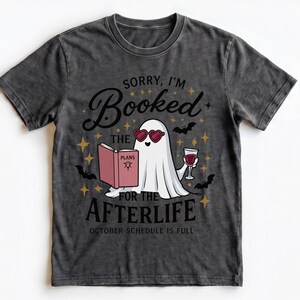 Halloween Book Shirt, Sorry I'm Booked for the Afterlife, Ghost Book Lover Tee, Fall Reading Shirt
👻 SORRY, I'M BOOKED FOR THE AFTERLIFE

For the reader whose October schedule is already completely full.