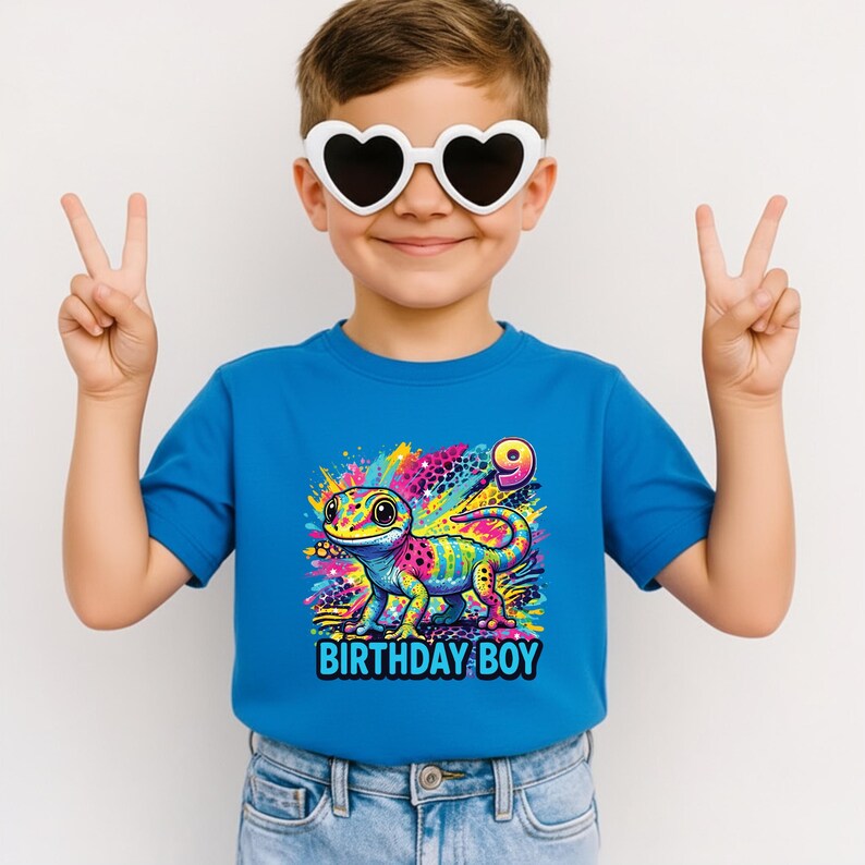 Custom Gecko Birthday Boy Shirt, Rainbow 90s inspired Gecko,y2k colorful,Maximalist Adult Kids.Make her milestone truly unique with this customizable neon-rainbow Gecko birthday shirt! Whether she is turning one, seven, or ten, you can personalize this vibrant design with any age to match her special celebration. This eye-catching cub design is perfect for the birthday girl who loves bright colors and wild adventures.