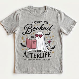 Halloween Book Shirt, Sorry I'm Booked for the Afterlife, Ghost Book Lover Tee, Fall Reading Shirt
👻 SORRY, I'M BOOKED FOR THE AFTERLIFE

For the reader whose October schedule is already completely full.