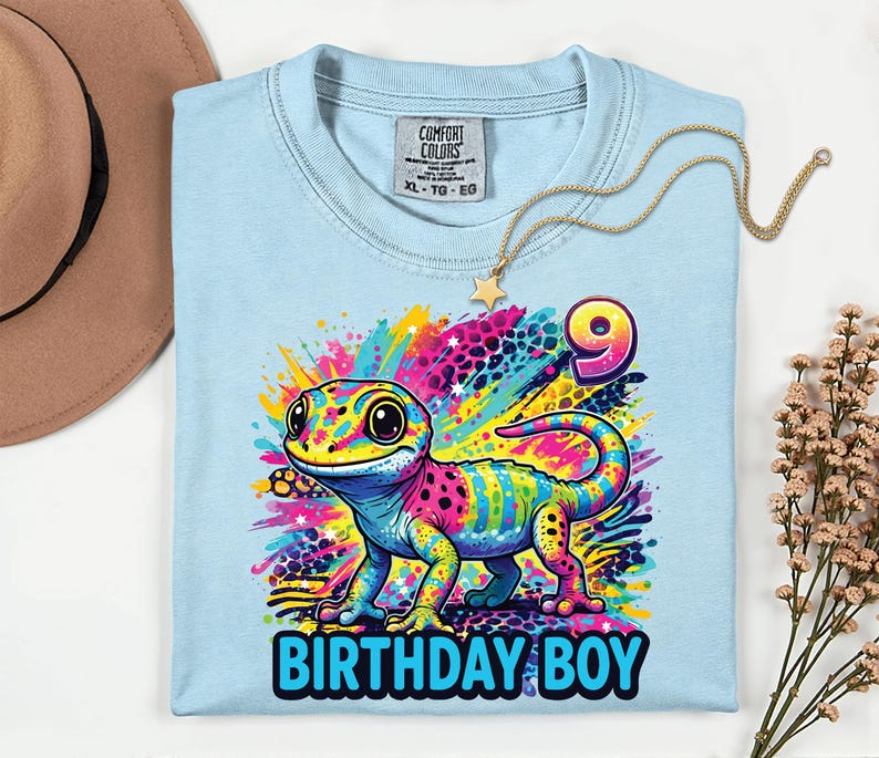 Custom Rainbow Gecko 90s inspired Reptile Birthday Girl Shirt,Comfort,y2k colorful,Maximalist Adult Kids.Make her milestone truly unique with this customizable neon-rainbow Gecko birthday shirt! Whether she is turning one, seven, or ten, you can personalize this vibrant design with any age to match her special celebration. This eye-catching cub design is perfect for the birthday girl who loves bright colors and wild adventures.