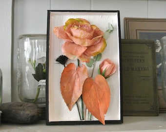 Paper flowers in shadow box rose in neutral colours