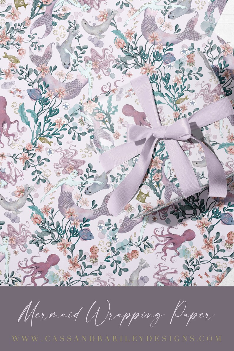 May include: A pink and purple mermaid wrapping paper with a repeating pattern of mermaids, sea creatures, and flowers. The text "Mermaid Wrapping Paper" and "www.cassandra riley designs.com" is printed at the bottom of the paper.