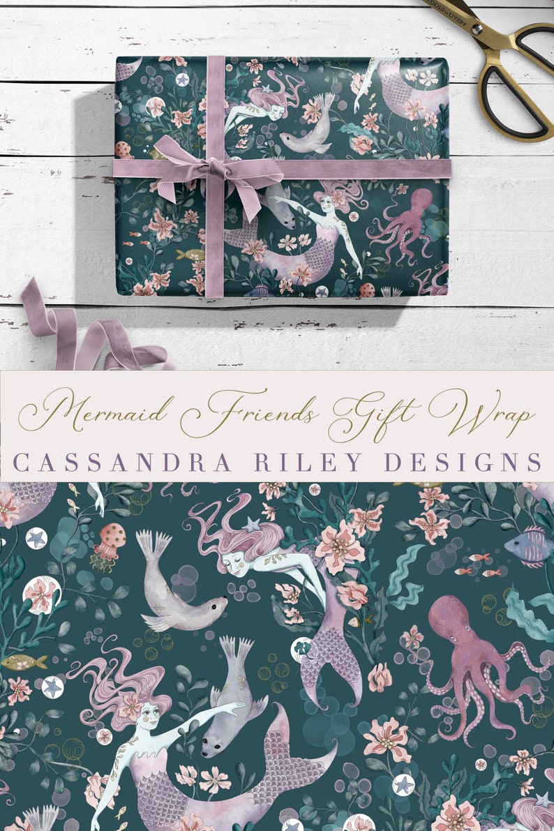 May include: Teal blue wrapping paper with a repeating pattern of mermaids, seals, octopuses, and flowers. The text "Mermaid Friends Gift Wrap" and "CASSANDRA RILEY DESIGNS" is printed on the paper.