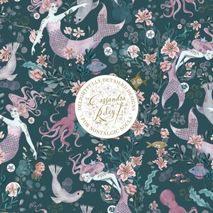 A teal blue background with a repeating pattern of mermaids, seals, octopuses, and flowers. The mermaids are pink and purple with long flowing hair. The seals are grey and white. The octopuses are pink and purple. The flowers are pink and white. The text "Delightfully Detailed Designs Cassandra Riley for Nostalgic Souls" is in a circle in the centre of the pattern.