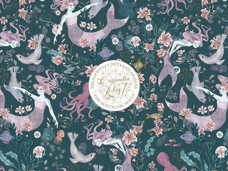 A teal blue background with a repeating pattern of mermaids, seals, octopuses, and flowers. The mermaids are pink and purple with long flowing hair. The seals are grey and white. The octopuses are pink and purple. The flowers are pink and white. The text "Delightfully Detailed Designs Cassandra Riley for Nostalgic Souls" is in a circle in the centre of the pattern.